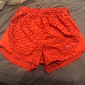 Red/orange and black stripped Nike shorts!!
